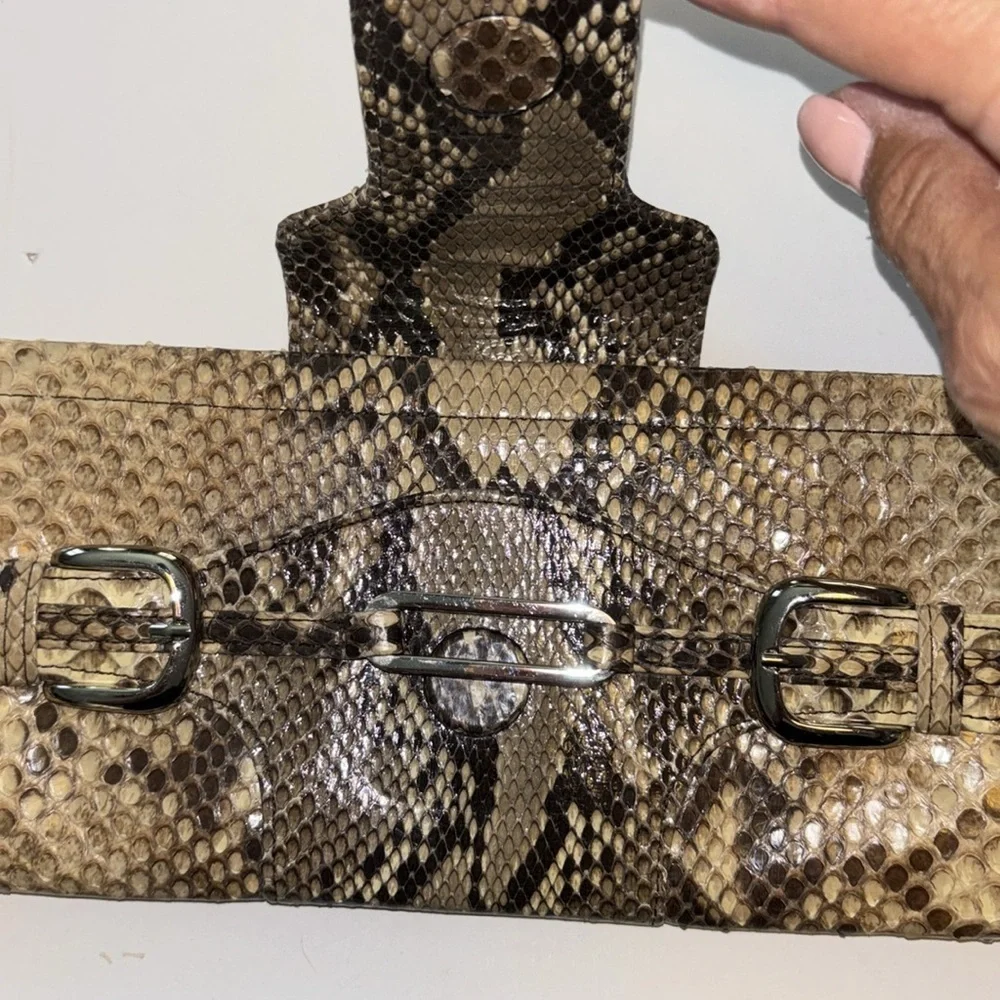 Source Unknown gorgeous clutch